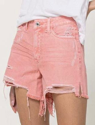 Pink distressed shorts